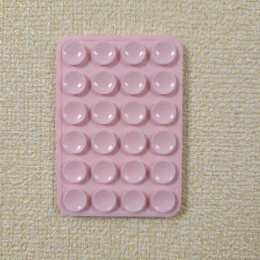 Double-Sided Silicone Suction Phone Holder – Stick, Hold & Glow!