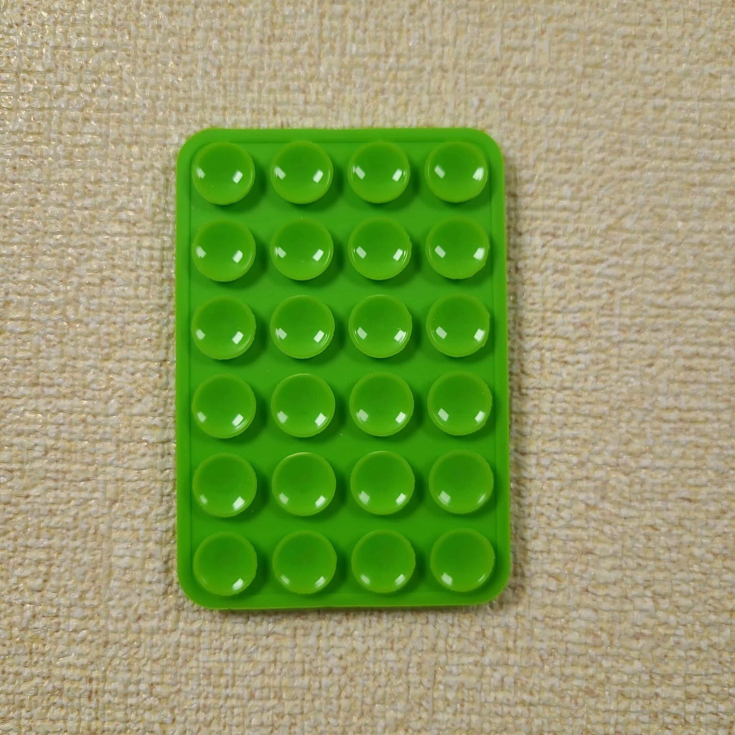 Double-Sided Silicone Suction Phone Holder – Stick, Hold & Glow!