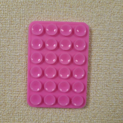 Double-Sided Silicone Suction Phone Holder – Stick, Hold & Glow!
