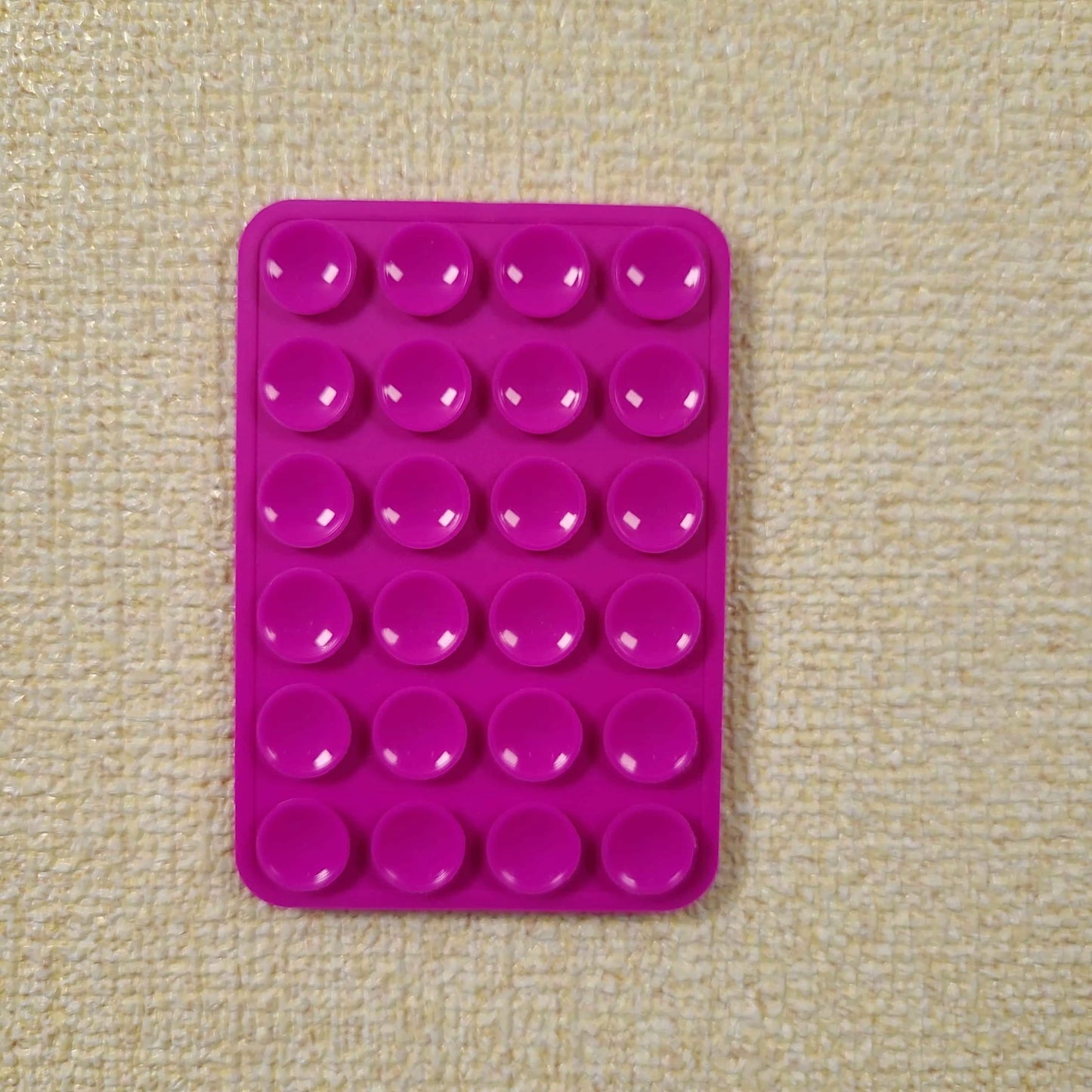 Double-Sided Silicone Suction Phone Holder – Stick, Hold & Glow!